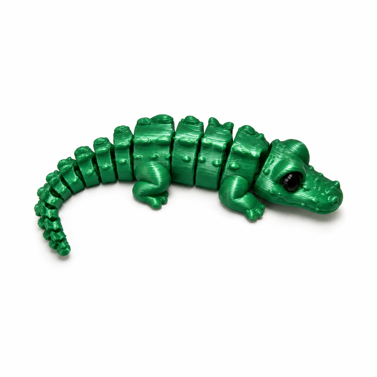 Cocodrilo articulado impreso en 3D con PLA Silk Candy Green de Figutech, acabado seda brillante
