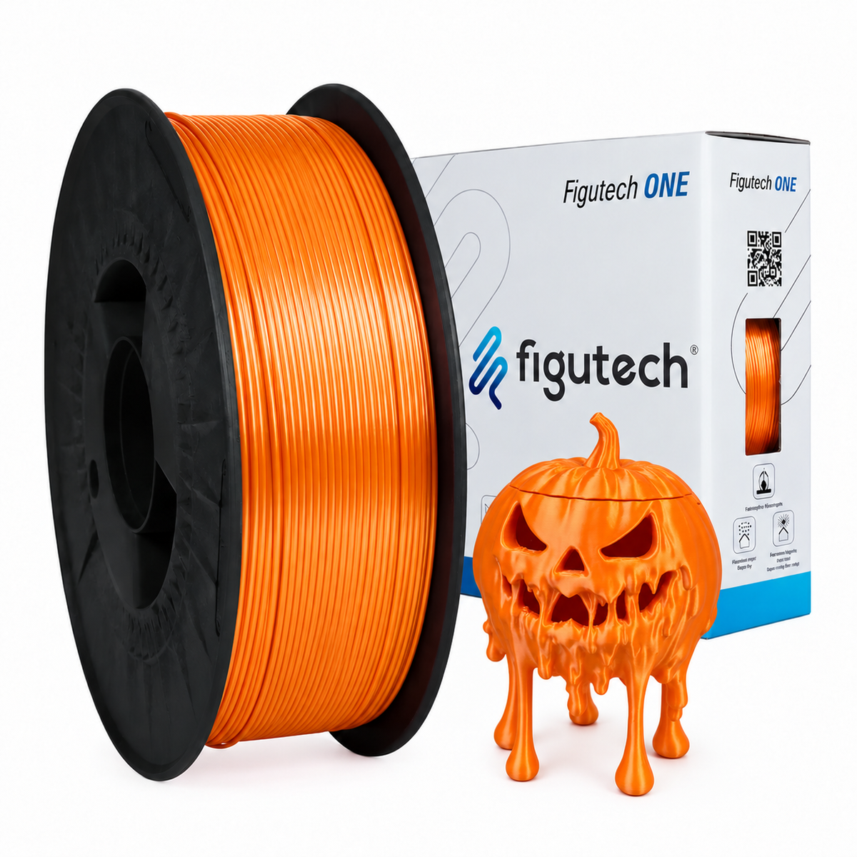 Filamento PLA Silk Naranja Figutech ONE 1,75 mm 1 kg con su caja y una calabaza de Halloween impresa con él